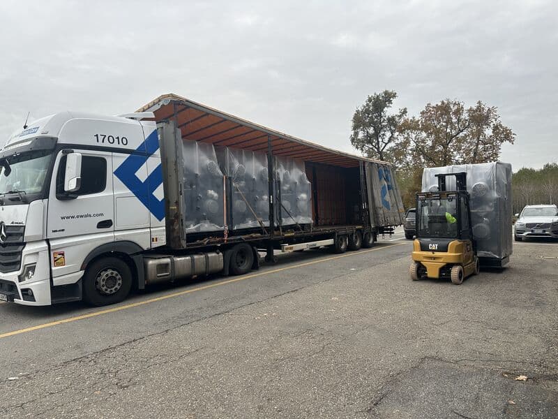 Loading radiator onto truck